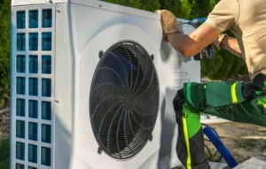 depositphotos 603974652 stock photo caucasian hvac worker installing electric